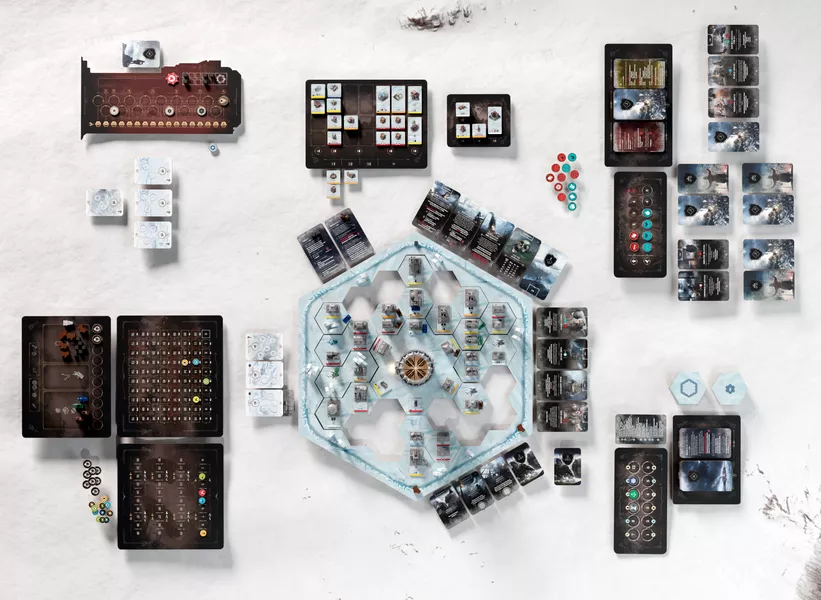 A downward shot of the setup for Frostpunk: the Board Game. It's a complicated setup taking up a lot of space.